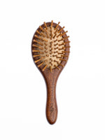 sandalwood hairbrush with bristles on a white background